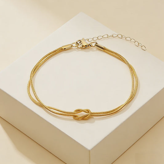 Dubbele Slangenketting Armband met Liefdesknoop - Roestvrij Staal Goudkleurig