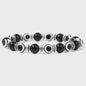Set van 2 Handgemaakte Natuursteen Armbanden met Hanger Oog van Fatima & Lavasteen/Hematiet