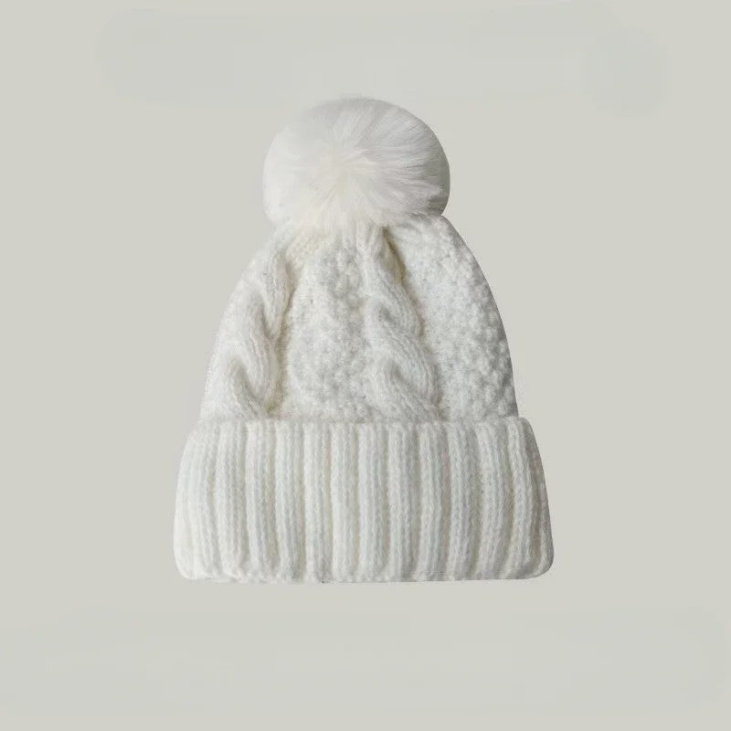 Warme Gebreide Wintermuts met Pluche Pompom - Stijlvol & Veelzijdig