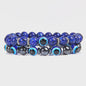 Set van 2 Handgemaakte Natuursteen Armbanden met Hanger Oog van Fatima & Lavasteen/Hematiet