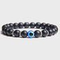 Set van 2 Handgemaakte Natuursteen Armbanden met Hanger Oog van Fatima & Lavasteen/Hematiet