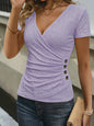 Dameswikkel T-shirt met korte mouwen en knoopdetails