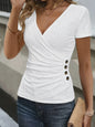 Dameswikkel T-shirt met korte mouwen en knoopdetails