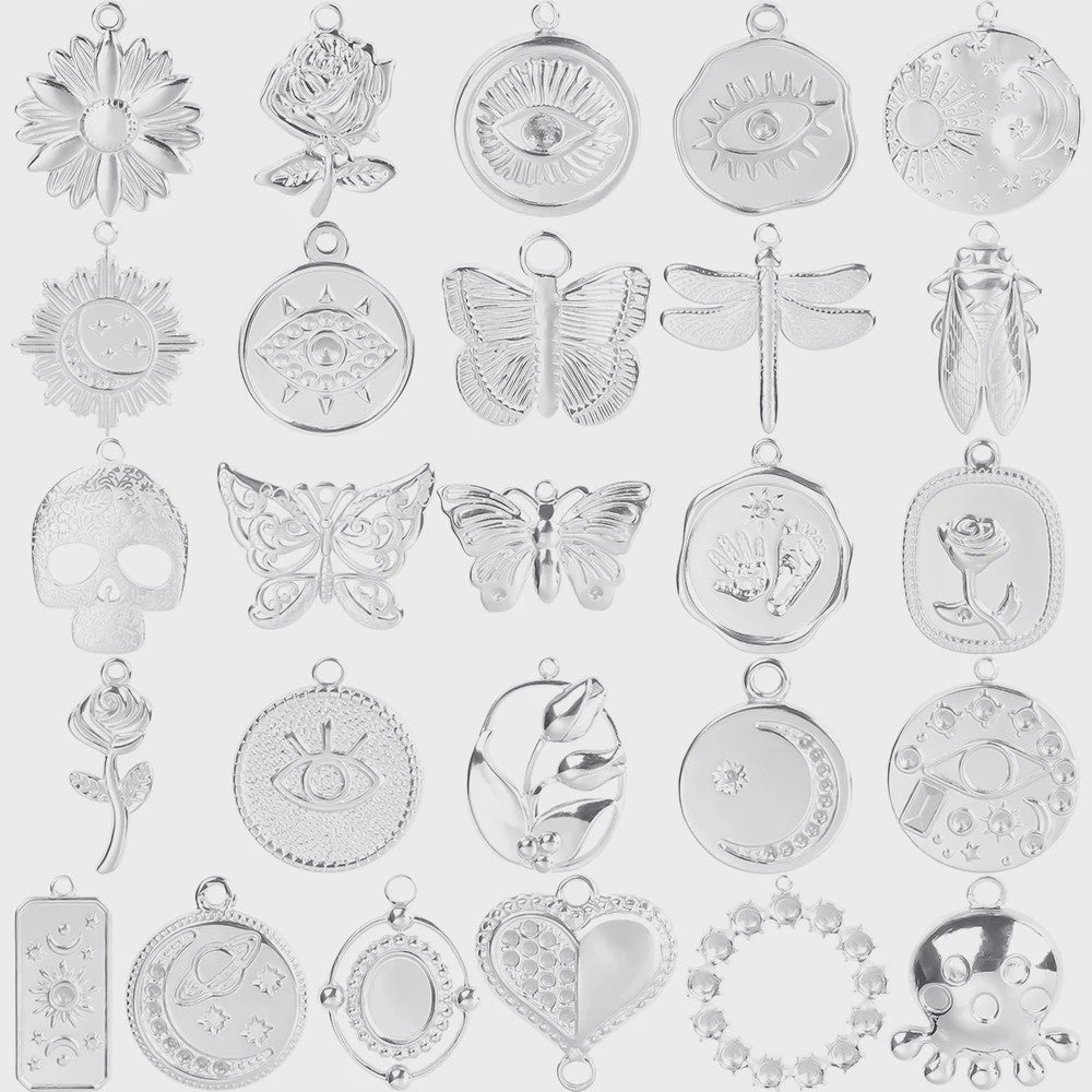 Set van 5 Zilverkleurige Stainless Steel Bedels: Ster, Maan, Zon, Vlinder, Roos & Ojo Turco