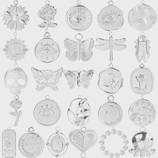 Set van 5 Zilverkleurige Stainless Steel Bedels: Ster, Maan, Zon, Vlinder, Roos & Ojo Turco
