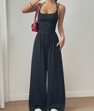 Zomerse Zwarte Jumpsuit met Losse Rechte Pijpen en Halternek