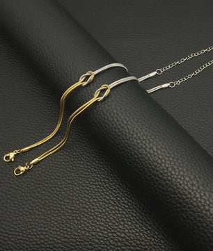 Dubbele Slangenketting Armband met Liefdesknoop - Roestvrij Staal Goudkleurig