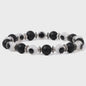 Set van 2 Handgemaakte Natuursteen Armbanden met Hanger Oog van Fatima & Lavasteen/Hematiet