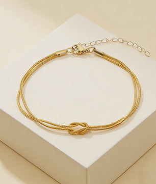 Dubbele Slangenketting Armband met Liefdesknoop - Roestvrij Staal Goudkleurig
