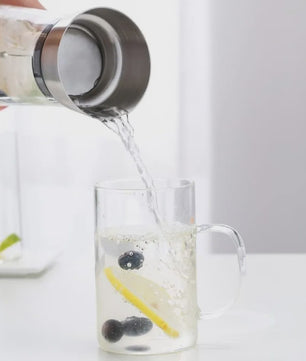 Stijlvolle Glazen Waterkan met Deksel - 1 Liter - Perfect voor Water, Sap, IJsthee & Limonade