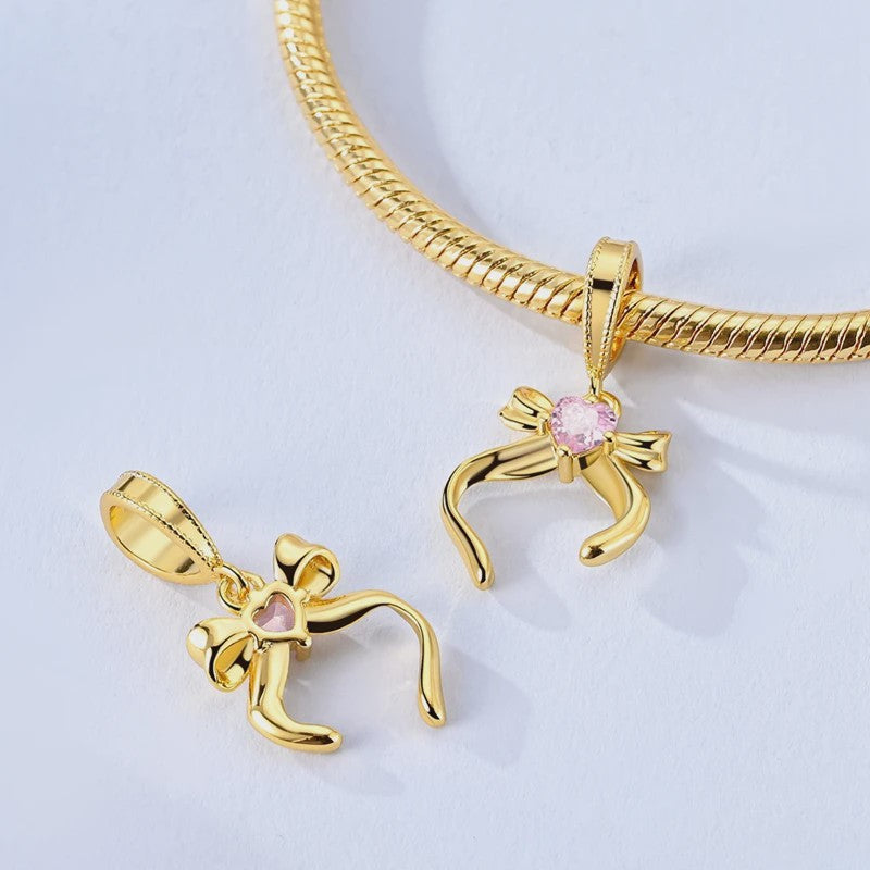 925 Sterling Zilveren Bedel: Gouden Strik met Roze Hart & Kruis met Oog van Horus