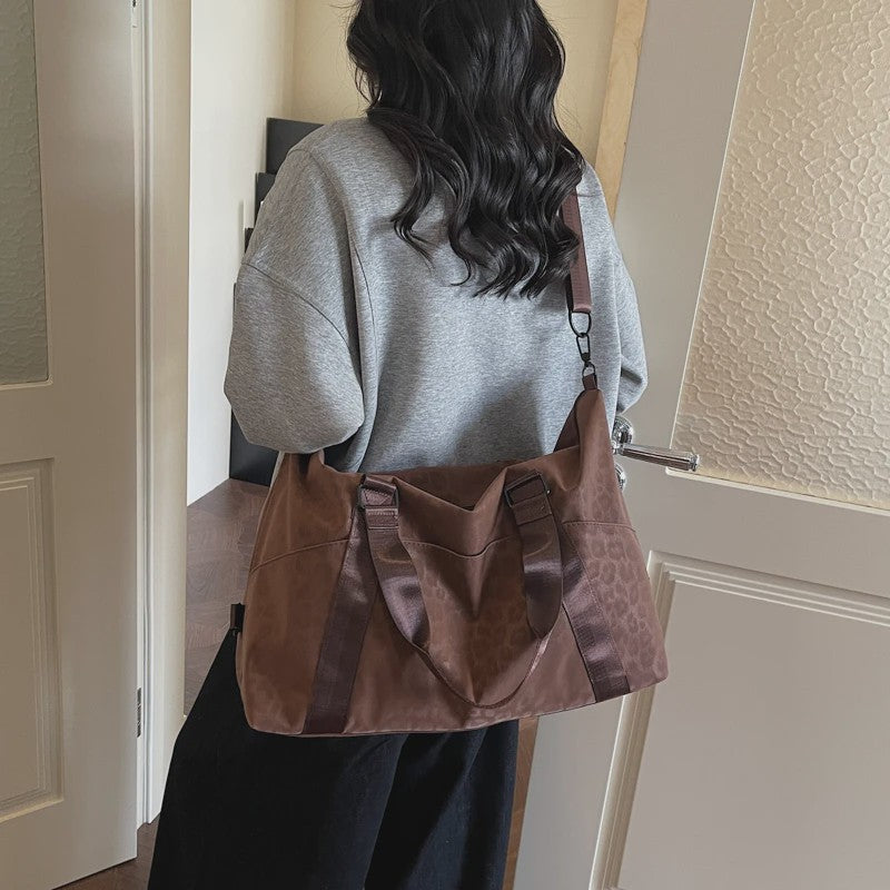 Stijlvolle Leopard Print Duffle Bag: Grote Reistas met Verstelbare Band voor Dames