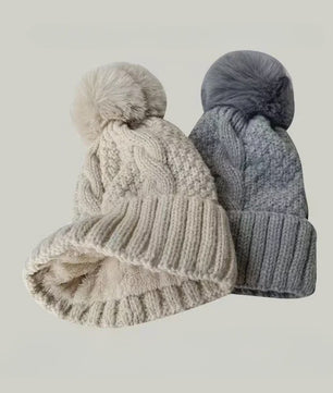 Warme Gebreide Wintermuts met Pluche Pompom - Stijlvol & Veelzijdig