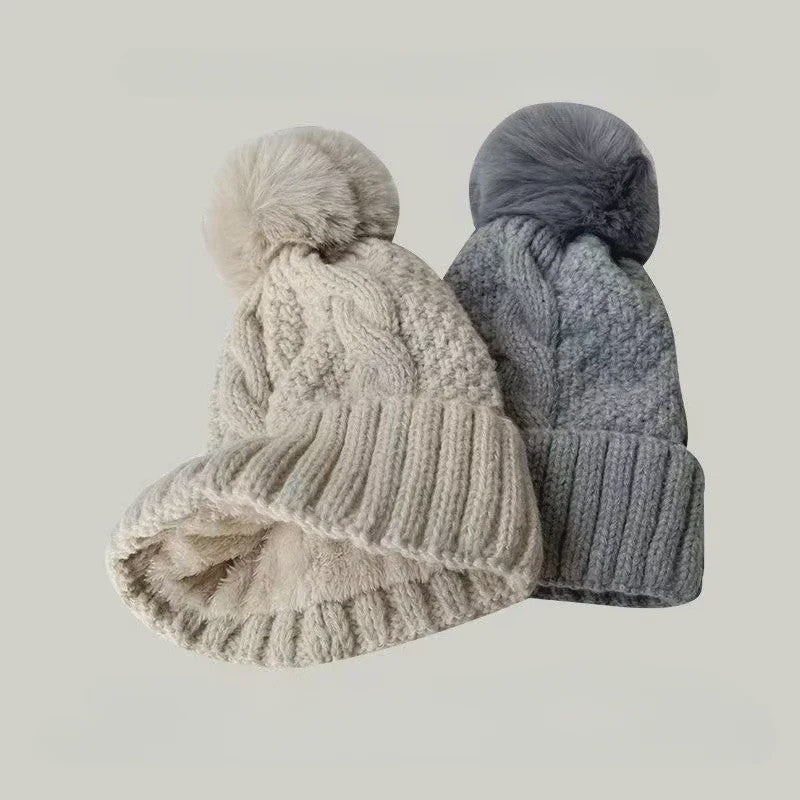 Warme Gebreide Wintermuts met Pluche Pompom - Stijlvol & Veelzijdig