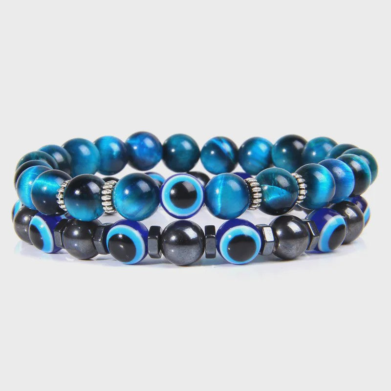 Set van 2 Handgemaakte Natuursteen Armbanden met Hanger Oog van Fatima & Lavasteen/Hematiet