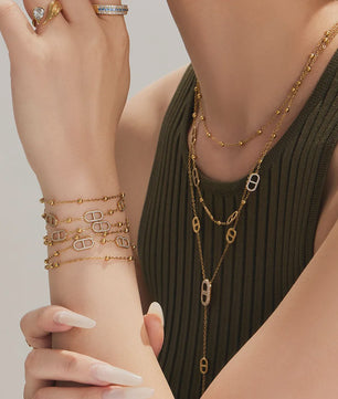 Dainty Gelaagde Sieraden Set: 18k Goudkleurig Roestvrij Staal Collier & Armband met Zirkonia