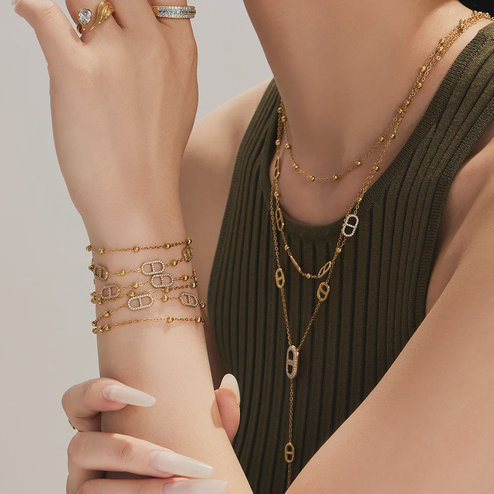 Dainty Gelaagde Sieraden Set: 18k Goudkleurig Roestvrij Staal Collier & Armband met Zirkonia
