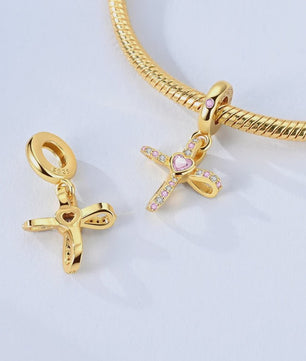 925 Sterling Zilveren Bedel: Gouden Strik met Roze Hart & Kruis met Oog van Horus
