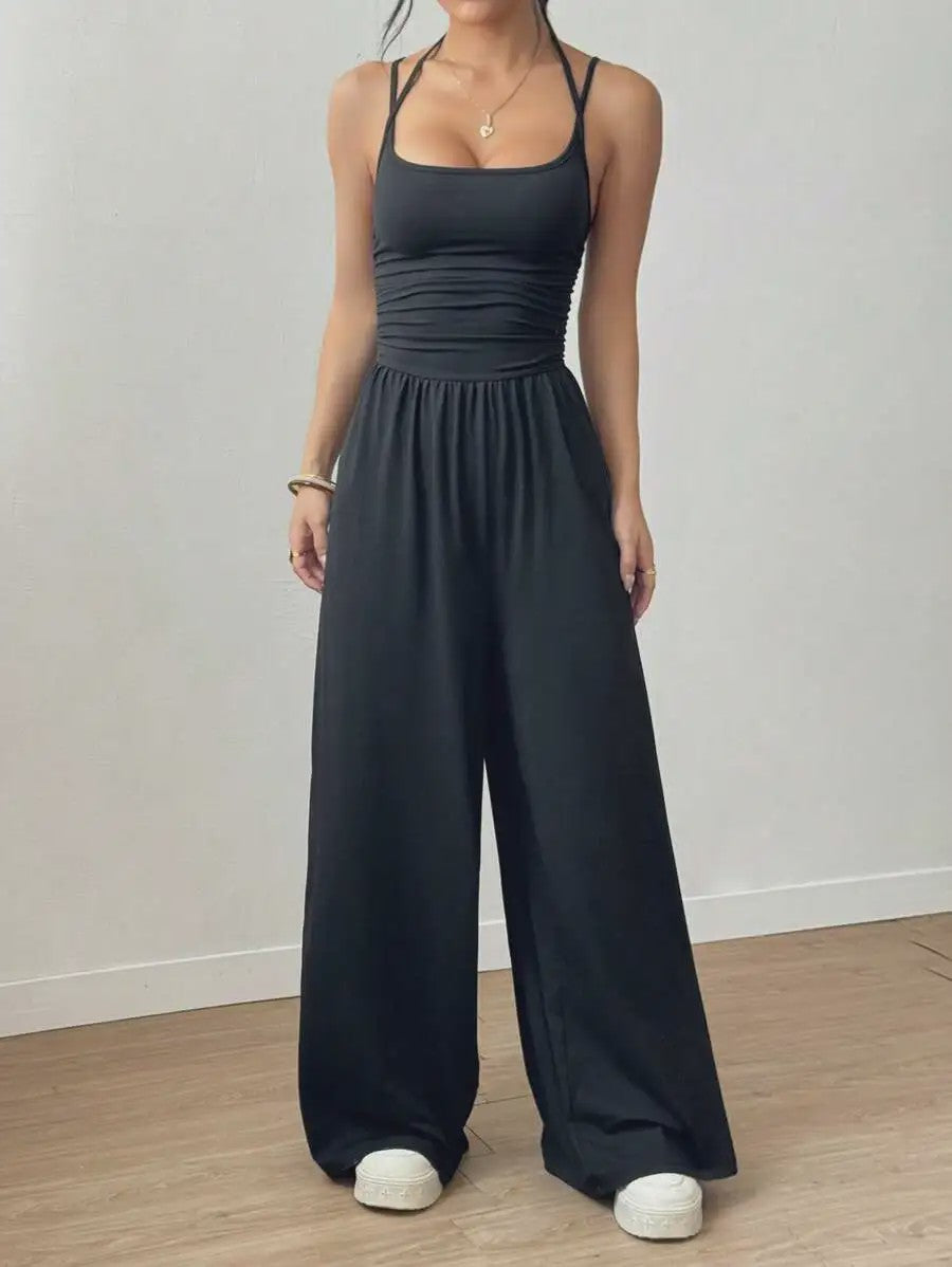 Zomerse Zwarte Jumpsuit met Losse Rechte Pijpen en Halternek