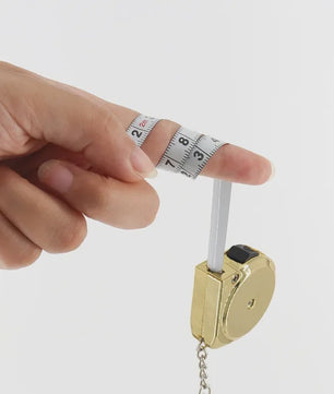 Mini Rolmaat Sleutelhanger 2 Meter - Compact Meetlint voor Huis, Hobby & Handwerken