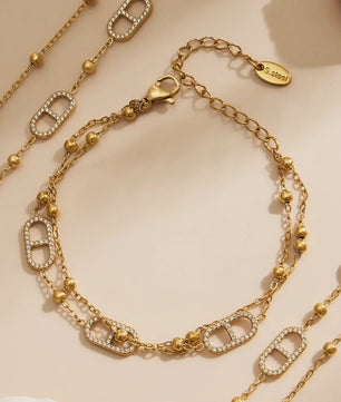 Dainty Gelaagde Sieraden Set: 18k Goudkleurig Roestvrij Staal Collier & Armband met Zirkonia