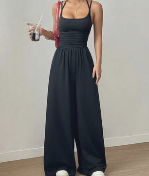 Zomerse Zwarte Jumpsuit met Losse Rechte Pijpen en Halternek