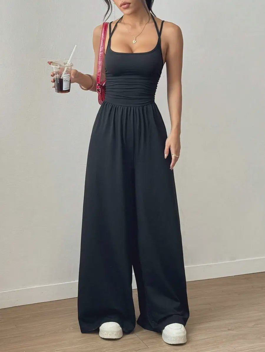 Zomerse Zwarte Jumpsuit met Losse Rechte Pijpen en Halternek
