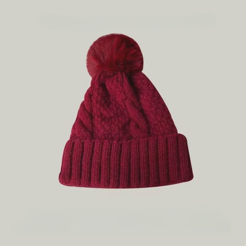 Warme Gebreide Wintermuts met Pluche Pompom - Stijlvol & Veelzijdig