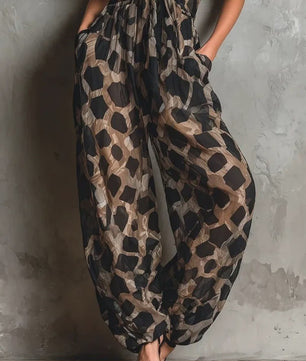 Stijlvolle Dames Jumpsuit met Panterprint, Mouwloos en Wijde Pijpen