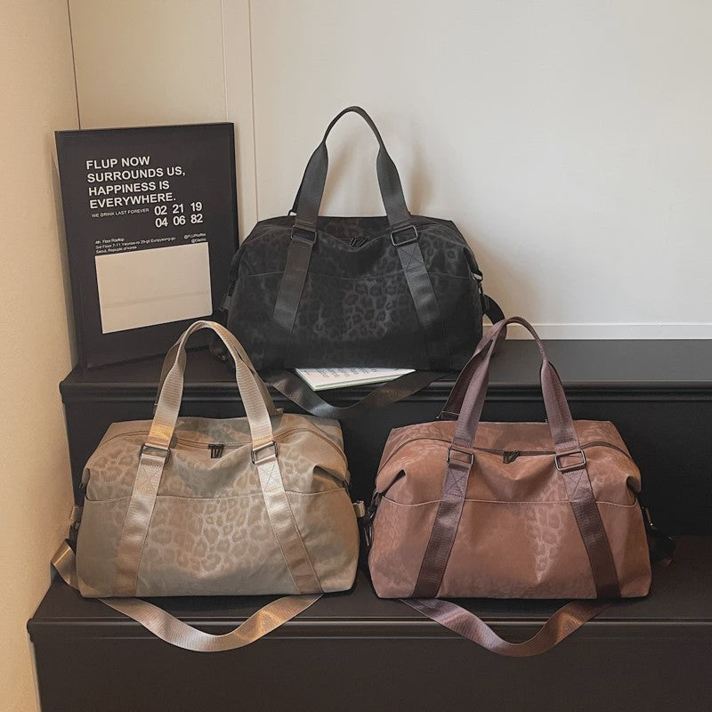 Stijlvolle Leopard Print Duffle Bag: Grote Reistas met Verstelbare Band voor Dames