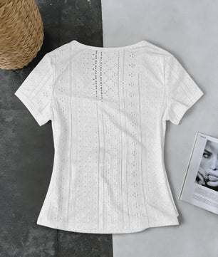 Dameswikkel T-shirt met korte mouwen en knoopdetails