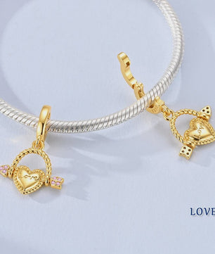 925 Sterling Zilveren Bedel: Gouden Strik met Roze Hart & Kruis met Oog van Horus