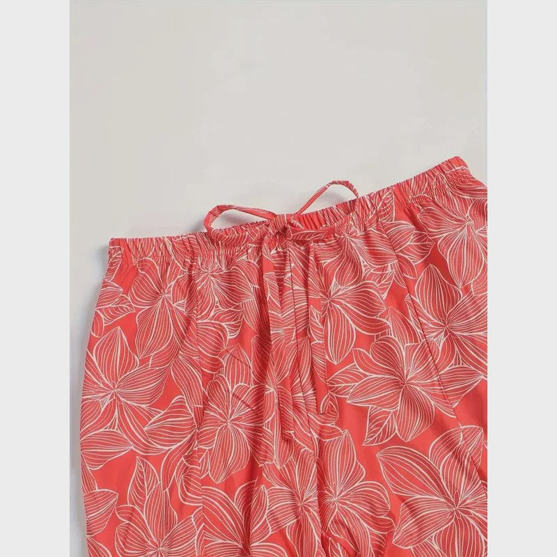 Zomerse Plus Size Wijde Pijp Broek met Bloemenprint en Elastische Tailleband
