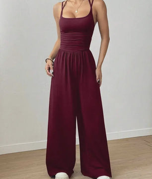 Zomerse Zwarte Jumpsuit met Losse Rechte Pijpen en Halternek