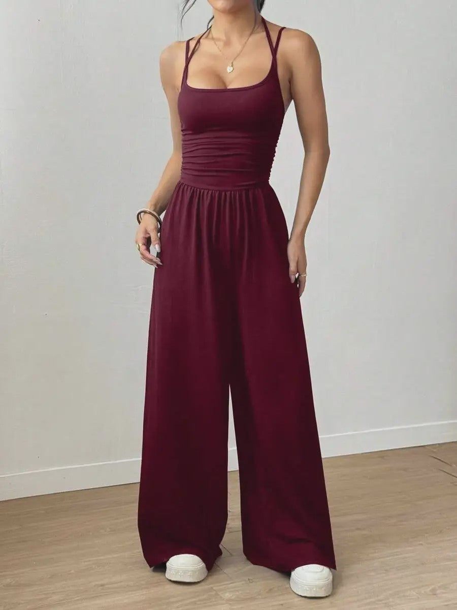 Zomerse Zwarte Jumpsuit met Losse Rechte Pijpen en Halternek