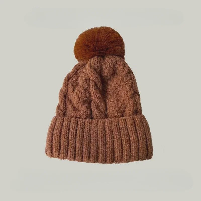 Warme Gebreide Wintermuts met Pluche Pompom - Stijlvol & Veelzijdig