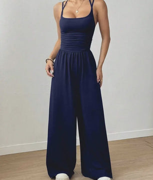 Zomerse Zwarte Jumpsuit met Losse Rechte Pijpen en Halternek