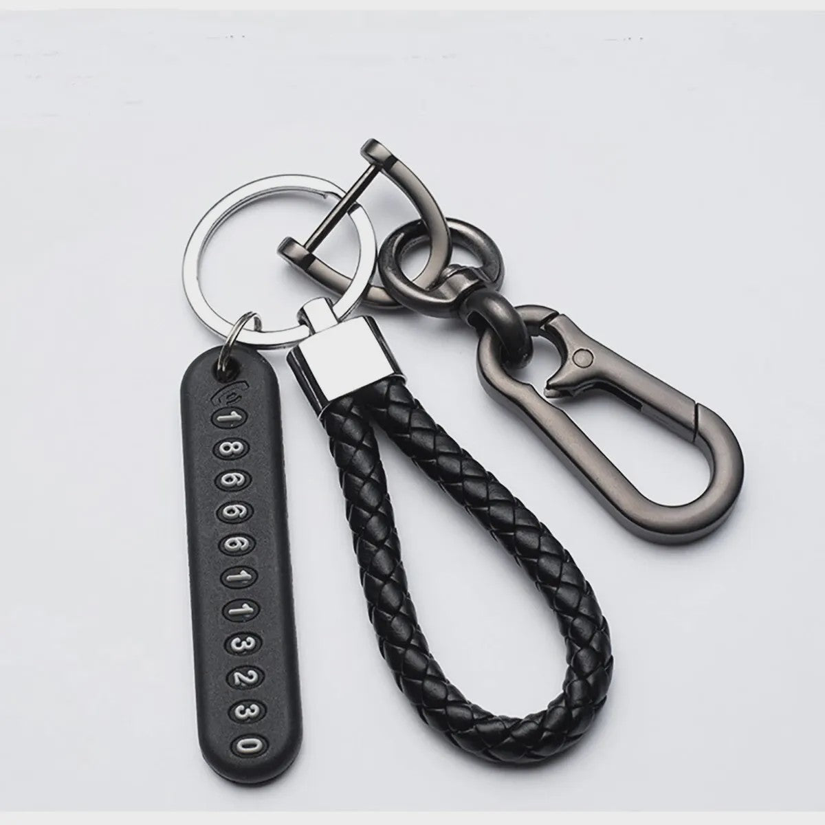 Trendy Leren Telefoonnummer Sleutelhanger voor Heren - Anti-verlies Auto Accessoire