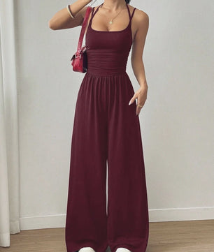 Zomerse Zwarte Jumpsuit met Losse Rechte Pijpen en Halternek