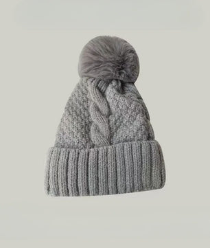 Warme Gebreide Wintermuts met Pluche Pompom - Stijlvol & Veelzijdig