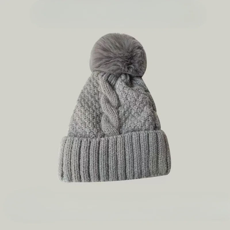 Warme Gebreide Wintermuts met Pluche Pompom - Stijlvol & Veelzijdig