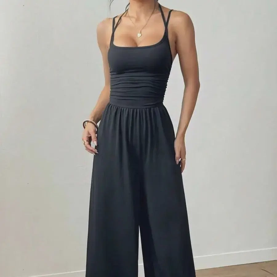 Zomerse Zwarte Jumpsuit met Losse Rechte Pijpen en Halternek