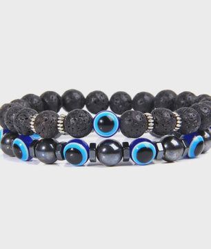 Set van 2 Handgemaakte Natuursteen Armbanden met Hanger Oog van Fatima & Lavasteen/Hematiet