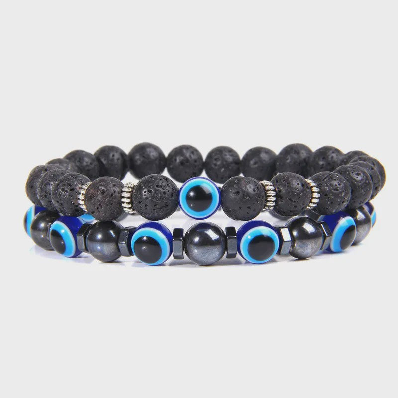 Set van 2 Handgemaakte Natuursteen Armbanden met Hanger Oog van Fatima & Lavasteen/Hematiet