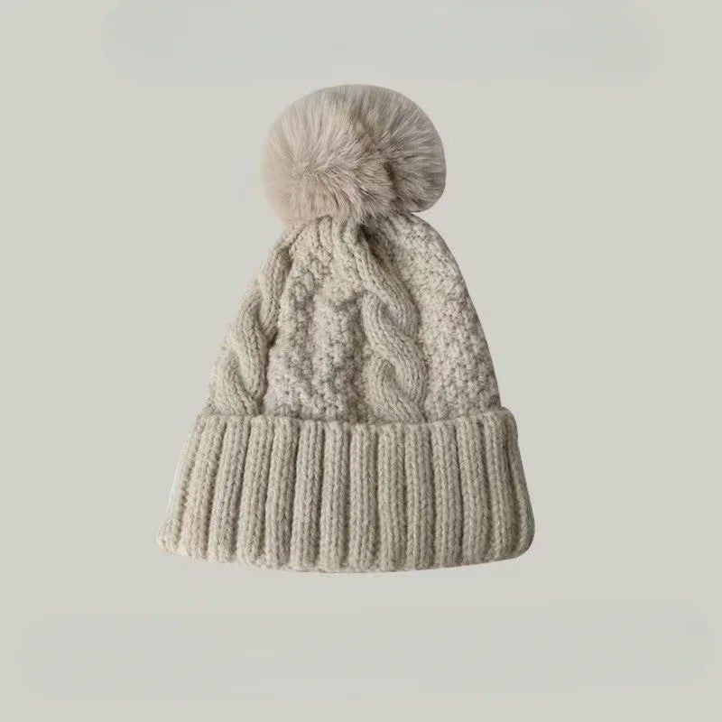 Warme Gebreide Wintermuts met Pluche Pompom - Stijlvol & Veelzijdig