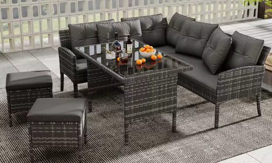 7-delige Loungeset met Eettafel – Rotan, Kussens & Glazen Tafelblad