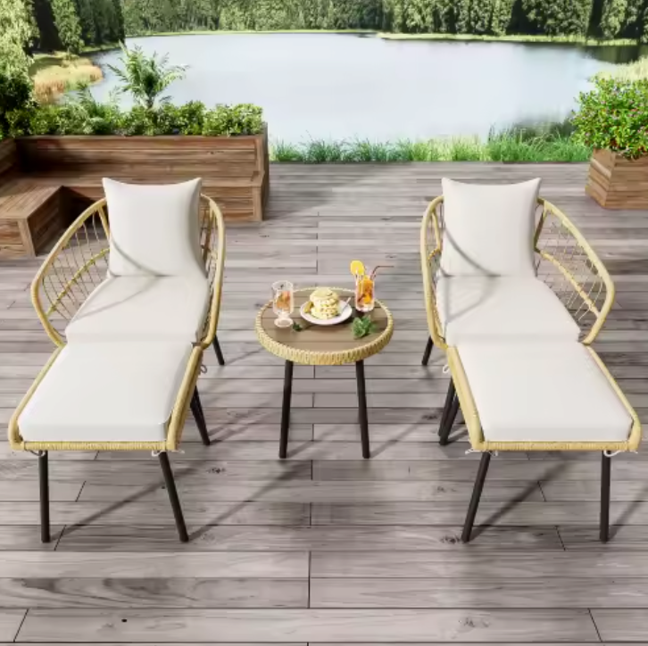 5-delige rotan loungeset met tafel, stoelen en krukken buiten