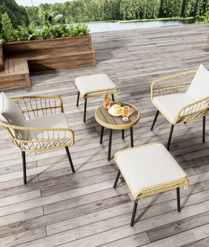 5-delige rotan loungeset met tafel, stoelen en krukken buiten